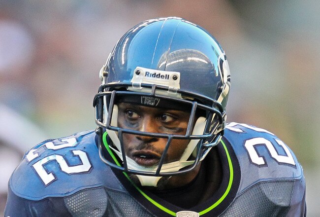 SEATTLE - AUGUST 14:  Running back Julius Jones #22 of the Seattle Seahawks rushes during the preseason game against the Tennessee Titans at Qwest Field on August 14, 2010 in Seattle, Washington. (Photo by Otto Greule Jr/Getty Images)