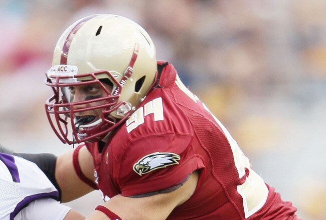 CHESTNUT HILL, MA - SEPTEMBER 04:  Mark Herzlich #94 of the Boston College Eagles blocks Erik Walker #83 of the Weber State Wildcats on September 4, 2010 at Alumni Stadium in Chestnut Hill, Massachusetts. Boston College defeated Weber State 38-20.  (Photo by Elsa/Getty Images)