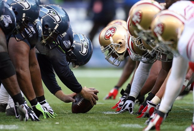 SEATTLE - DECEMBER 6:  The San Francisco 49ers defense lines up against the Seattle Seahawks offense during their NFL game on December 6, 2009 at Qwest Field in Seattle, Washington. The Seahawks defeated the 49ers 20-17. (Photo by Otto Greule Jr./Getty Images) *** Local Caption ***