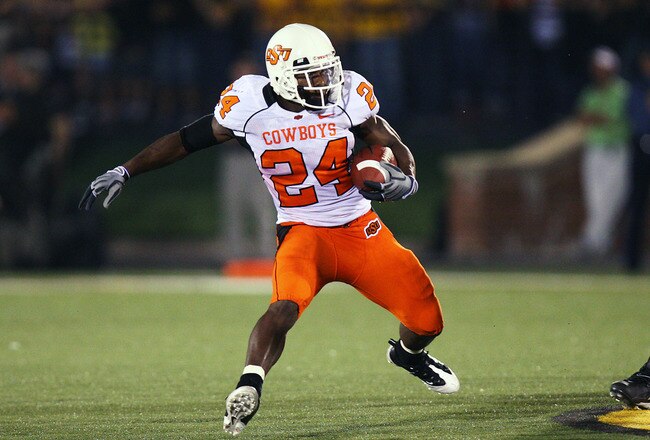 COLUMBIA, MO - OCTOBER 11:  Kendall Hunter #24 of the Oklahoma State Cowboys cuts back against the Missouri Tigers on October 11, 2008 at Memorial Stadium in Columbia, Missouri.  Oklahoma State won 28-23. (Photo by G. Newman Lowrance/Getty Images)