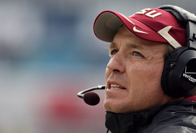 JACKSONVILLE, FL - JANUARY 01:  Offensive coordinator and future head coach Jimbo Fisher of the Florida State Seminoles walks the sidelines while taking on the West Virginia Mountaineers during the Konica Minolta Gator Bowl on January 1, 2010 at Jacksonville Municipal Stadium in Jacksonville, Florida. Florida State defeated West Virginia 33-21 in Bobby Bowden's last game as a head coach for the Seminoles.  (Photo by Doug Benc/Getty Images)