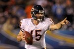 SAN DIEGO - AUGUST 14:  Quarterback Dan LeFevour  #15 of the Chicago Bears points as he scrambles with the ball against the San Diego Chargers on August 14, 2010 at Qualcomm Stadium in San Diego, California.   The Chargers won 25-10.   (Photo by Stephen Dunn/Getty Images)