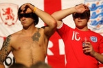 BLOEMFONTEIN, SOUTH AFRICA - JUNE 27:  England fans enjoy the atmosphere ahead of the 2010 FIFA World Cup South Africa Round of Sixteen match between Germany and England at Free State Stadium on June 27, 2010 in Bloemfontein, South Africa.  (Photo by Clive Rose/Getty Images)