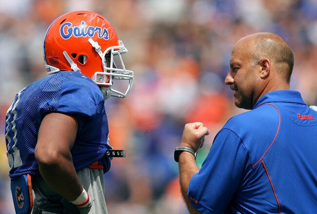 GAINESVILLE, FL - APRIL 10:  Offensive coordinator Steve Addazio, R, and quarterback Jordan Reed #11 of the Florida Gators celebrate Reed's game-winning touchdown pass during the Orange & Blue game at Ben Hill Griffin Stadium on April 10, 2010 in Gainesville, Florida.  (Photo by Doug Benc/Getty Images)