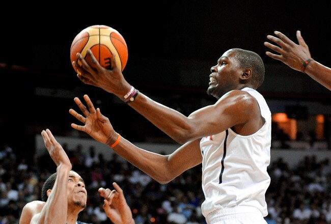 LAS VEGAS - JULY 24:  Kevin Durant #5 of the 2010 USA Basketball Men's National Team drives against JaVale McGee #14 of the 2010 USA Basketball Men's National Team during a USA Basketball showcase at the Thomas & Mack Center on July 24, 2010 in Las Vegas, Nevada.  (Photo by Ethan Miller/Getty Images)