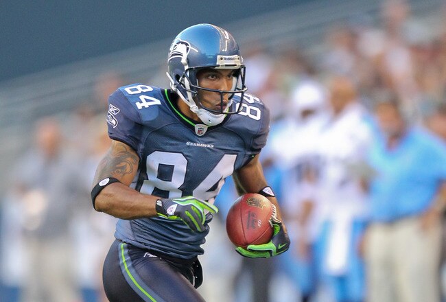 SEATTLE - AUGUST 14:  Wide receiver T.J. Houshmandzadeh #84 of the Seattle Seahawks rushes during the preseason game against  the Tennessee Titans at Qwest Field on August 14, 2010 in Seattle, Washington. (Photo by Otto Greule Jr/Getty Images)