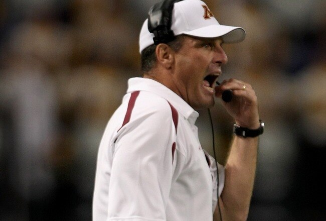 MINNEAPOLIS, MN - SEPTEMBER 08:  Head coach Tim Brewster leads the Minnesota Golden against the Miami of Ohio Redhawks as Minnesota defeated Miami of Ohio 41-35 in triple overtime at the Metrodome on September 8, 2007 in Minneapolis, Minnesota.  (Photo by Doug Pensinger/Getty Images)