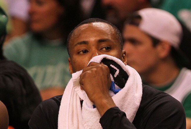 BOSTON - MAY 22:  Rashard Lewis #9 of the Orlando Magic looks on dejected from the bench against the Boston Celtics at TD Banknorth Garden in Game Three of the Eastern Conference Finals during the 2010 NBA Playoffs on May 22, 2010 in Boston, Massachusetts.  NOTE TO USER: User expressly acknowledges and agrees that, by downloading and/or using this Photograph, user is consenting to the terms and conditions of the Getty Images License Agreement.  (Photo by Jim Rogash/Getty Images)