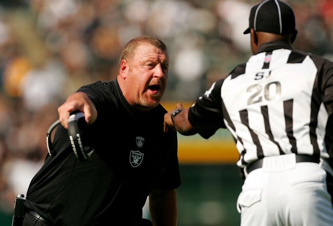 OAKLAND, CA - SEPTEMBER 27:  Oakland Raiders head coach Tom Cable argues with side judge Barry Anderson during their game against the Denver Broncos at the Oakland-Alameda County Coliseum on September 27, 2009 in Oakland, California.  (Photo by Ezra Shaw/Getty Images)