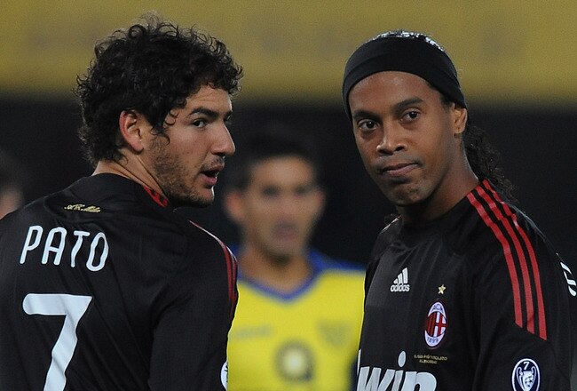VERONA, ITALY - OCTOBER 25:  Pato of AC Milan his congratulation by teammate and Ronaldinho during the Serie A match between AC Chievo Verona and AC Milan at Stadio Marcantonio Bentegodi on October 25, 2009 in Verona, Italy.  (Photo by Dino Panato/Getty Images)