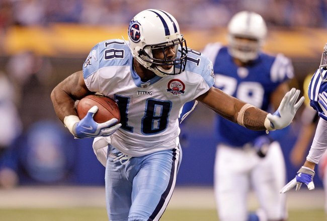 INDIANAPOLIS - DECEMBER 06:  Kenny Britt #18 of  the Tennessee Titans runs with the ball during the NFL game against the Indianapolis Colts at Lucas Oil Stadium on December 6, 2009 in Indianapolis, Indiana.  (Photo by Andy Lyons/Getty Images)