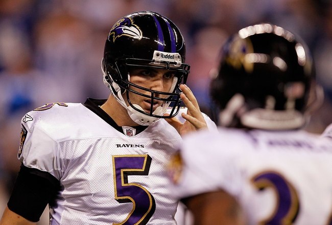 INDIANAPOLIS - JANUARY 16:  Quarterback Joe Flacco #5 of the Baltimore Ravens huddles with teammates against the Indianapolis Colts in the AFC Divisional Playoff Game at Lucas Oli Stadium on January 16, 2010 in Indianapolis, Indiana.  (Photo by Jonathan Daniel/Getty Images)
