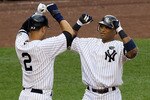 NEW YORK - AUGUST 22:  Robinson Cano #24 (2nd L) of the New York Yankees celebrates his fifth inning grand slam home run against the Seattle Mariners with teammate Derek Jeter #2 on August 22, 2010 at Yankee Stadium in the Bronx borough of New York City.  (Photo by Jim McIsaac/Getty Images)