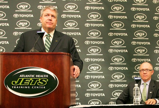 FLORHAM PARK, NJ - JANUARY 21: Rex Ryan  addresses the media during a press conference introducing him as the new Head Coach of the New York Jets as Owner Woody Johnson (C) and General Manager Mike Tannenbaum look on at the Atlantic Health Jets Training Center on January 21, 2009 in Florham Park, New Jersey.  (Photo by Andy Marlin/Getty Images)