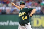 ARLINGTON, TX - JULY 29:  Vin Mazzaro #54 of the Oakland Athletics throws against the Texas Rangers on July 29, 2010 at Rangers Ballpark in Arlington, Texas.  (Photo by Ronald Martinez/Getty Images)