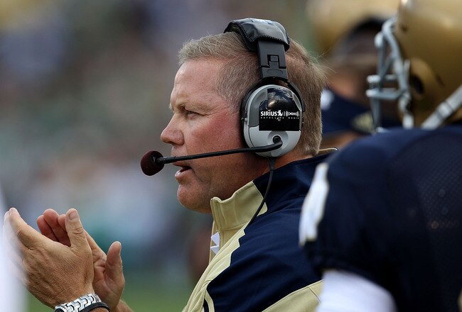 SOUTH BEND, IN - SEPTEMBER 04: Head coach Brian Kelly of the Notre Dame Fighting Irish encourages his team against the Purdue Boilermakers at Notre Dame Stadium on September 4, 2010 in South Bend, Indiana. (Photo by Jonathan Daniel/Getty Images)