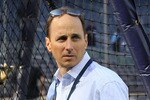 NEW YORK - APRIL 30:  General manager Brian Cashman of the New York Yankees looks on during batting practice prior to the game against the Chicago White Sox on April 30, 2010 at Yankee Stadium in the Bronx borough of New York City.  (Photo by Jim McIsaac/Getty Images)