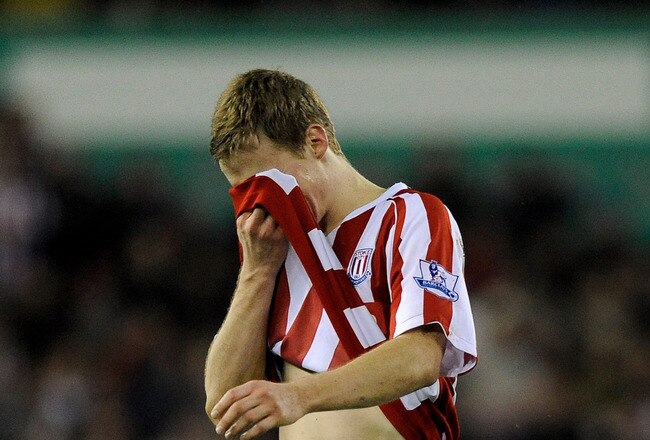 STOKE ON TRENT, ENGLAND - FEBRUARY 27:  Ryan Shawcross of Stoke City leaves the pitch in tears after being sent off for a challenge on Aaron Ramsey of Arsenal during the Barclays Premier League match between Stoke City and Arsenal at The Britannia Stadium on February 27, 2010 in Stoke on Trent, England.  (Photo by Laurence Griffiths/Getty Images)
