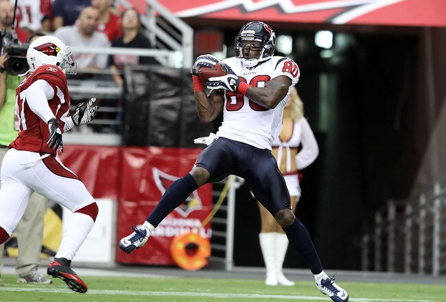 GLENDALE, AZ - AUGUST 14:  Wide receiver Andre Johnson #80 of the Houston Texans catches a 44 yard touchdown reception past Justin Miller #47 of the Arizona Cardinals during preseason NFL game at the University of Phoenix Stadium on August 14, 2010 in Glendale, Arizona.  The Cardinals defeated the Texans 19-16.  (Photo by Christian Petersen/Getty Images)