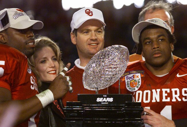 3 Jan 2001:  Head Coach Bob Stoops, J.T. Thatcher #15 and Ontei Jones #11 of the Oklahoma Sooners celebrate after defeating the Florida State Seminoles 13-2 to win the Orange Bowl at Pro Player Stadium in Miami, Florida. DIGITAL IMAGE Mandatory Credit: Brian Bahr/ALLSPORT