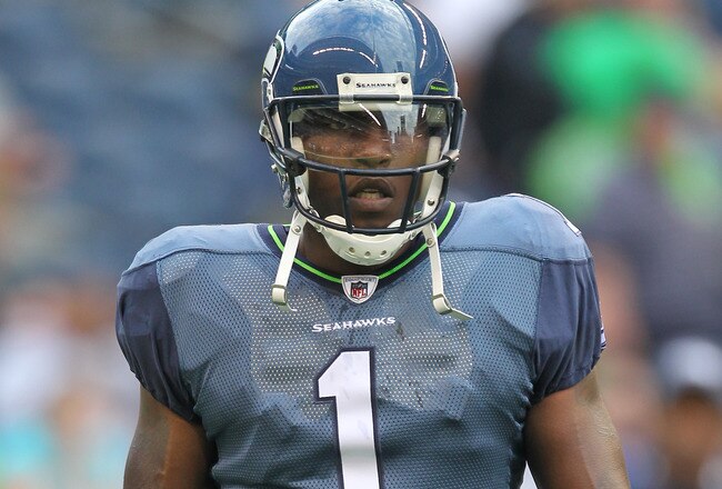 SEATTLE - AUGUST 21:  Wide receiver Mike Williams #1 of the Seattle Seahawks looks on during warmups prior to the preseason game against the Green Bay Packers at Qwest Field on August 21, 2010 in Seattle, Washington. (Photo by Otto Greule Jr/Getty Images)