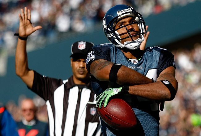 SEATTLE , WA - OCTOBER 11:  T. J. Houshmandzadeh #84 of the Seattle Seahawks celebrates scoring a touchdown against the Jacksonville Jaguars at Qwest Field on October 11, 2009 in Seattle, Washington.  (Photo by Jonathan Ferrey/Getty Images)