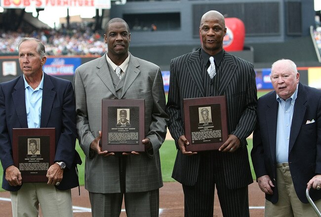 NEW YORK - AUGUST 01: Mets Hall of Fame inductees (L-R) Davey Johnson, Dwight Gooden, Darryl Strawberry and Frank Cashen pose for photographers prior to the game between the Arizona Diamondbacks and the New York Mets at Citi Field on August 1, 2010 in the Flushing neighborhood of the Queens borough of New York City.  (Photo by Nick Laham/Getty Images)     Darryl Strawberry and Dwight Gooden join former manager Davey Johnson and former general manager Frank Cashen