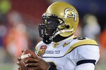 TAMPA, FL - DECEMBER 5: Quarterback Josh Nesbitt #9 of the Georgia Tech Yellow Jackets warms up for play against the Clemson Tigers in the 2009 ACC Football Championship Game December 5, 2009 at Raymond James Stadium in Tampa, Florida.  (Photo by Al Messerschmidt/Getty Images)