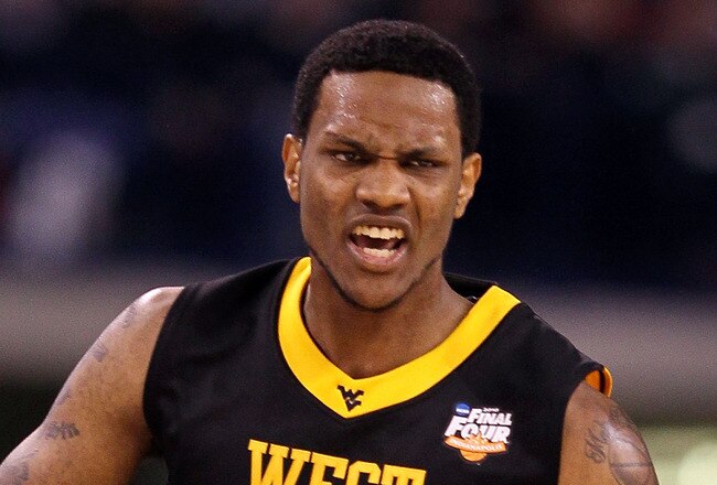 INDIANAPOLIS - APRIL 03:  Devin Ebanks #3 of the West Virginia Mountaineers reacts in the first half against the Duke Blue Devils during the National Semifinal game of the 2010 NCAA Division I Men's Basketball Championship at Lucas Oil Stadium on April 3, 2010 in Indianapolis, Indiana.  (Photo by Andy Lyons/Getty Images)