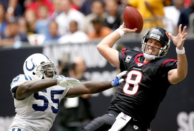 HOUSTON - NOVEMBER 29:  Linebacker Clint Session #55 of the Indianapolis Colts gets to quarterback Matt Schaub #8 of the Houston Texans to forca an incomplete pass on November 29, 2009  at Reliant Stadium in Houston, Texas. The Colts won 35-27.  (Photo by Stephen Dunn/Getty Images)