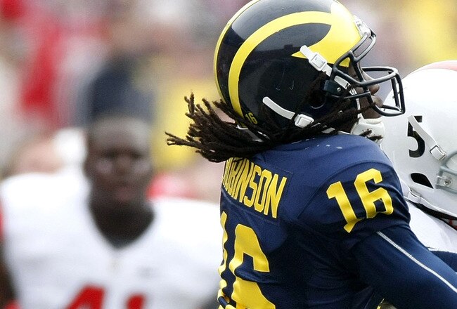 ANN ARBOR, MI - NOVEMBER 21: Denard Robinson #16 of the Michigan Wolverines tries to catch a second quarter pass behind Chimdi Chekwa #5 of the Ohio State Buckeyes on November 21, 2009 at Michigan Stadium in Ann Arbor, Michigan.  (Photo by Gregory Shamus/Getty Images)