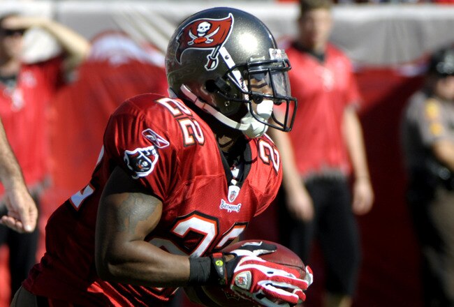 TAMPA, FL - DECEMBER 21: Running back Clifton Smith #22 of the Tampa Bay Buccaneers returns a kick against the San Diego Chargers at Raymond James Stadium on December 21, 2008 in Tampa, Florida.  (Photo by Al Messerschmidt/Getty Images)