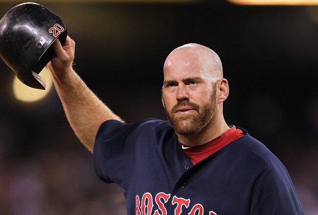 SEATTLE - JULY 24:  Kevin Youkilis #20 of the Boston Red Sox removes his helmet after the Red Sox were retired in the eighth inning with two runners on against the Seattle Mariners at Safeco Field on July 24, 2010 in Seattle, Washington. (Photo by Otto Greule Jr/Getty Images)
