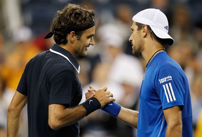 NEW YORK - SEPTEMBER 06:  Roger Federer (L) of Switzerland is congratulated by Jurgen Melzer of Austria afte Federer won their men's singles match during day eight of the 2010 U.S. Open at the USTA Billie Jean King National Tennis Center on September 6, 2010 in the Flushing neighborhood of the Queens borough of New York City.  (Photo by Matthew Stockman/Getty Images)