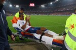 BASEL, SWITZERLAND - SEPTEMBER 07: Theo Walcott of England leaves the field on a stretcher during the UEFA EURO 2012 Group G Qualifier between Switzerland and England at St Jakob Park on September 7, 2010 in Basel, Switzerland.  (Photo by Clive Rose/Getty Images)