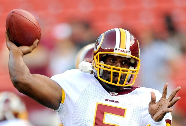 LANDOVER, MD - AUGUST 21:  Donovan McNabb #5 of the Washington Redskins warms up before the preseason game against the Baltimore Ravens at FedExField on August 21, 2010 in Landover, Maryland.  (Photo by Greg Fiume/Getty Images)