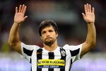 MILAN, ITALY - AUGUST 17:  (FILE PHOTO)  Diego of Juventus celebrates after scoring the opening goal of the Luigi Berlusconi Trophy match between AC Milan and Juventus FC at Giuseppe Meazza Stadium on August 17, 2009 in Milan, Italy. Regarding reports Diego changes from Juventus Turin to VfL Wolfsburg.  (Photo by Claudio Villa/Getty Images)