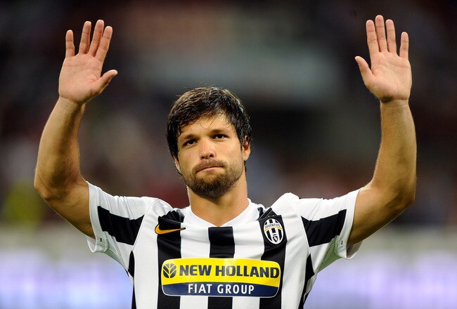 MILAN, ITALY - AUGUST 17:  (FILE PHOTO)  Diego of Juventus celebrates after scoring the opening goal of the Luigi Berlusconi Trophy match between AC Milan and Juventus FC at Giuseppe Meazza Stadium on August 17, 2009 in Milan, Italy. Regarding reports Diego changes from Juventus Turin to VfL Wolfsburg.  (Photo by Claudio Villa/Getty Images)