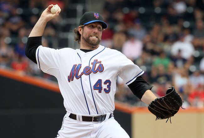 NEW YORK - JULY 29:  R.A. Dickey #43 of the New York Mets delivers a pitch against the St. Louis Cardinals on July 29, 2010 at Citi Field in the Flushing neighborhood of the Queens borough of New York City.  (Photo by Jim McIsaac/Getty Images)
