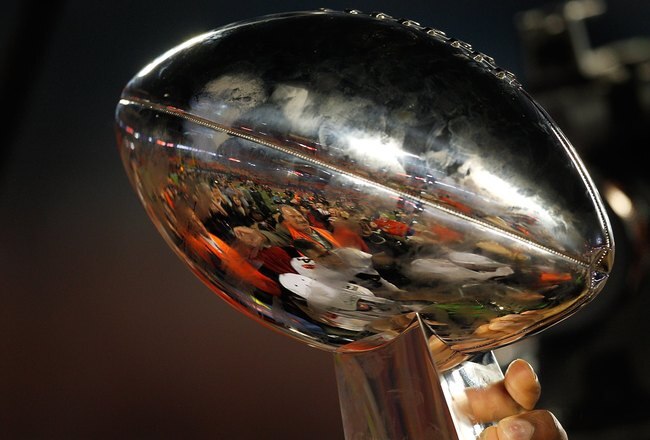 MIAMI GARDENS, FL - FEBRUARY 07:  A detail of the Vince Lombardi Trophy as the New Orleans Saints celebrate after defeating the Indianapolis Colts during Super Bowl XLIV on February 7, 2010 at Sun Life Stadium in Miami Gardens, Florida.  (Photo by Jonathan Daniel/Getty Images)