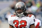 SEATTLE - DECEMBER 20:  Kareem Huggins #32 of the Tampa Bay Buccaneers looks on during warm-up prior to their game against the Seattle Seahawks on December 20, 2009 at Qwest Field in Seattle, Washington. The Buccaneers defeated the Seahawks 24-7. (Photo by Otto Greule Jr/Getty Images)