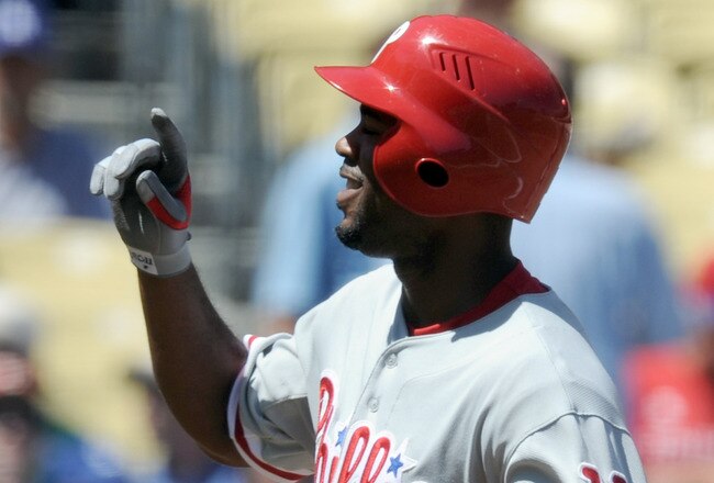 LOS ANGELES, CA - SEPTEMBER 01:  Jimmy Rollins #11 of the Philadelphia Phillies celebrates his leadoff homerun off of Clayton Kershaw #22 of the Los Angeles Dodgers for a 1-0 lead during the first inning at Dodger Stadium on September 1, 2010 in Los Angeles, California.  (Photo by Harry How/Getty Images)