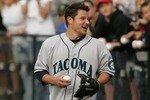 TACOMA, WA - AUGUST 25: Nick Lachey pitches the ball during a Celebrity Softball Tournament at Cheney Stadium on August 25, 2007 in Tacoma, Washington. The tournament benefitted Tacoma General's Neonatal Intensive Care Unit. (Photo by Kevin Casey/Getty Images for Tacoma Rainiers)