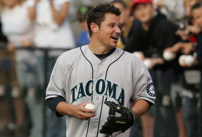 TACOMA, WA - AUGUST 25: Nick Lachey pitches the ball during a Celebrity Softball Tournament at Cheney Stadium on August 25, 2007 in Tacoma, Washington. The tournament benefitted Tacoma General's Neonatal Intensive Care Unit. (Photo by Kevin Casey/Getty Images for Tacoma Rainiers)