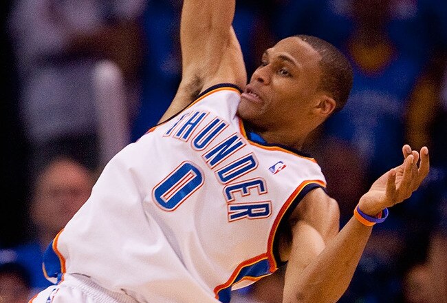 OKLAHOMA CITY - APRIL 30: Russell Westbrook #0 of the Oklahoma City Thunder pulls down a rebound against Luke Walton #4 of the Los Angeles Lakers during Game Six of the Western Conference Quarterfinals of the 2010 NBA Playoffs on April 30, 2010 at the Ford Center in Oklahoma City, Oklahoma.  The Lakers beat the Thunder 95-94.  NOTE TO USER: User expressly acknowledges and agrees that, by downloading and or using this photograph, User is consenting to the terms and conditions of the Getty Images License Agreement.  (Photo by Dilip Vishwanat/Getty Images)
