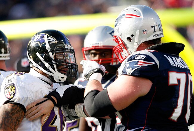 FOXBORO, MA - JANUARY 10:  Logan Mankins #70 of the New England Patriots and Ed Reed #20 of  the Baltimore Ravens get in each others face during the 2010 AFC wild-card playoff game at Gillette Stadium on January 10, 2010 in Foxboro, Massachusetts.  (Photo by Elsa/Getty Images)