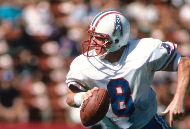 LOS ANGELES - NOVEMBER 11:  Quaterback Archie Manning #8 of the Houston Oilers rolls out to pass during the game against the Los Angeles Raiders at the Los Angeles Memorial Coliseum on November 11, 1983 in Los Angeles, California.  The Raiders won 20-6.  (Photo by George Rose/Getty Images)