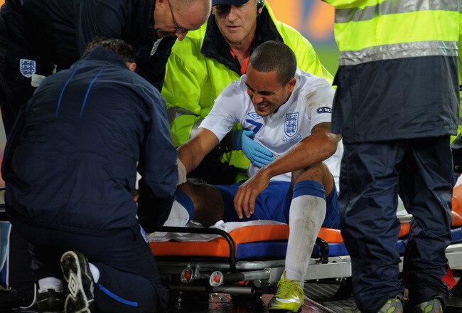 BASEL, SWITZERLAND - SEPTEMBER 07: Theo Walcott of England is stretchered off injured during the UEFA EURO 2012 Group G Qualifier between Switzerland and England at St Jakob Park on September 7, 2010 in Basel, Switzerland.  (Photo by Michael Regan/Getty Images)
