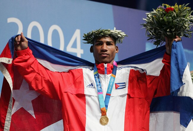 ATHENS - AUGUST 28:  Yuriorkis Gamboa Toledano of Cuba, Gold medalist in the men's boxing 51 kg event on August 28, 2004 during the Athens 2004 Summer Olympic Games at Peristeri Olympic Boxing Hall in Athens, Greece. (Photo by Al Bello/Getty Images)