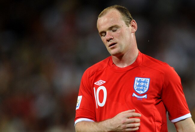 BLOEMFONTEIN, SOUTH AFRICA - JUNE 27:  Dejected Wayne Rooney of England after being knocked out of the tournament during the 2010 FIFA World Cup South Africa Round of Sixteen match between Germany and England at Free State Stadium on June 27, 2010 in Bloemfontein, South Africa.  (Photo by Michael Regan/Getty Images)